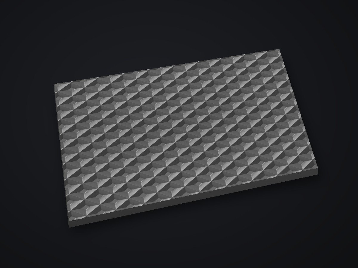 Black rubber workshop mat with a diamond tread pattern